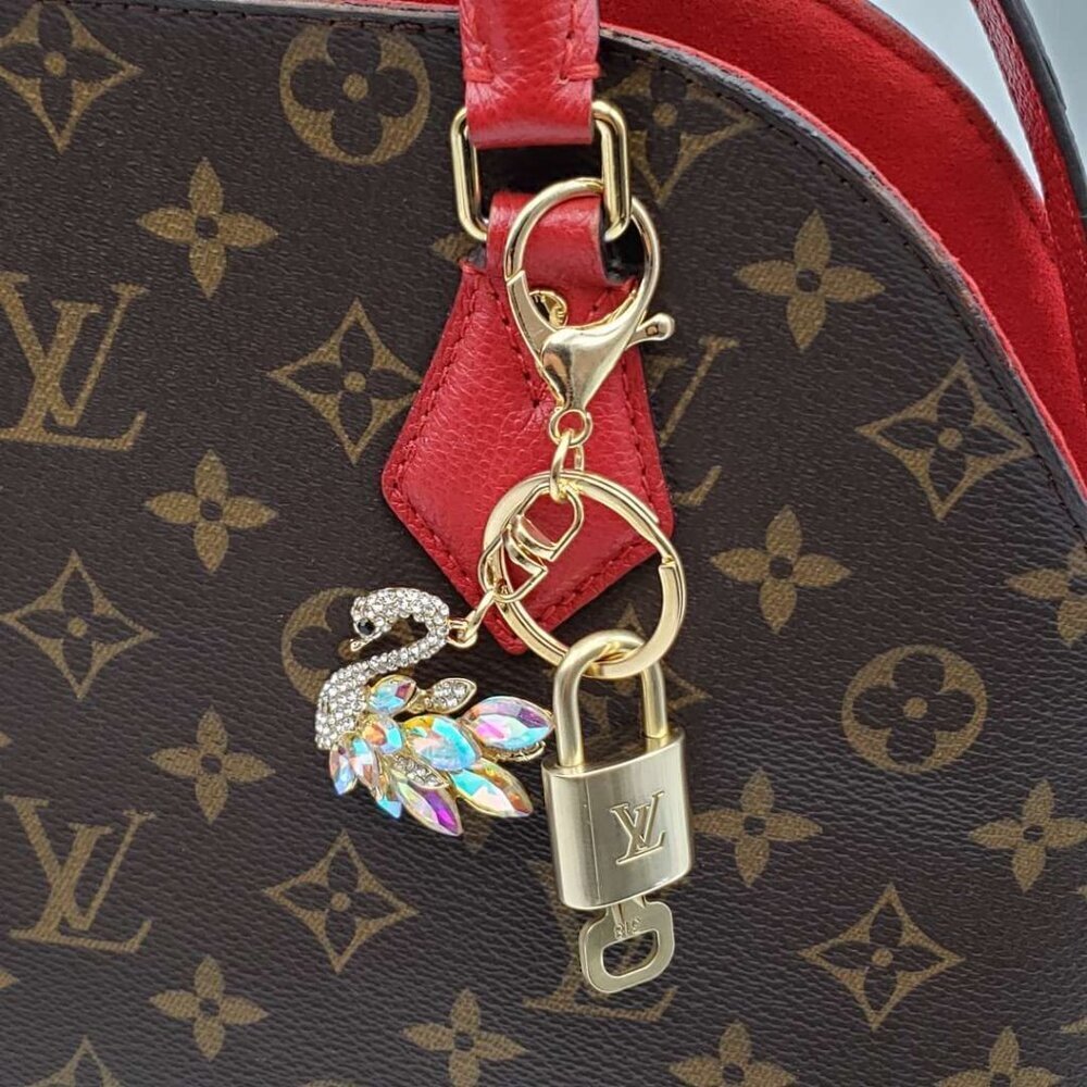 Authentic Louis Vuitton Gold Padlock & Key with Unbranded Swan Keychain - Picture 6 of 8